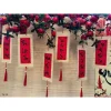 Liễn mành tre trang trí tết. Mành tre thư pháp giấy đỏ câu đối. Liễn treo cành hoa đào, hoa mai